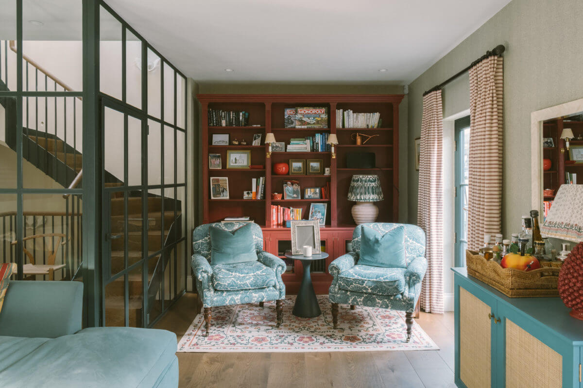 sitting-room-red-bookcase-steel-glass-door-wall-notting-hill-mews-house-nordroom