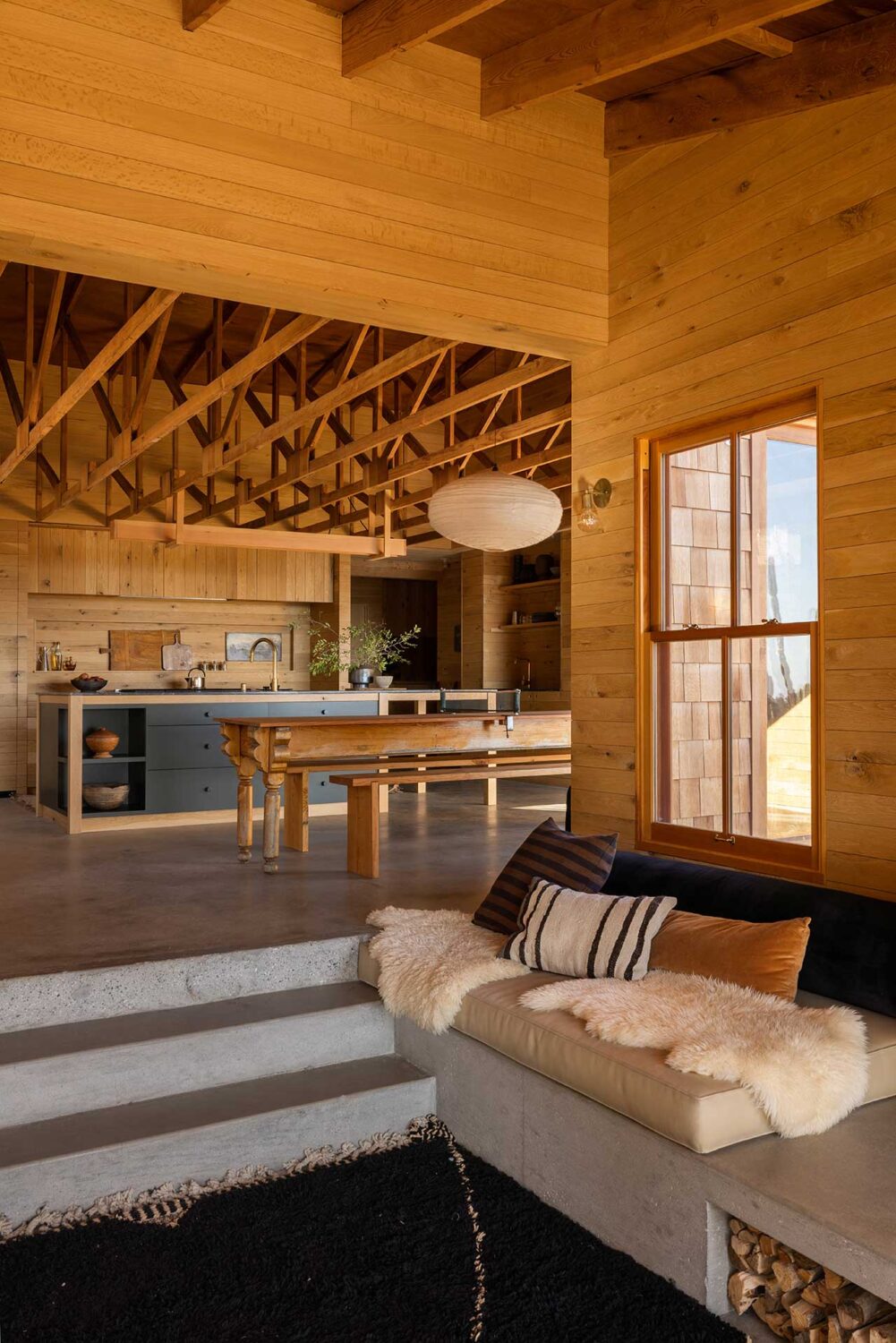 The Warm Mountaintop Home of Actor Hayden Christensen 2 sunken-living-room-kitchen-wooden-mountaintop-home-nordroom