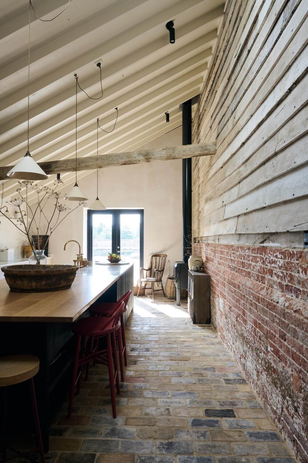 Kitchen-island-The-Sebastian-Cox-Kitchen-deVOL-bar-stone-floor-brick-wall-sloped-ceiling-nordroom