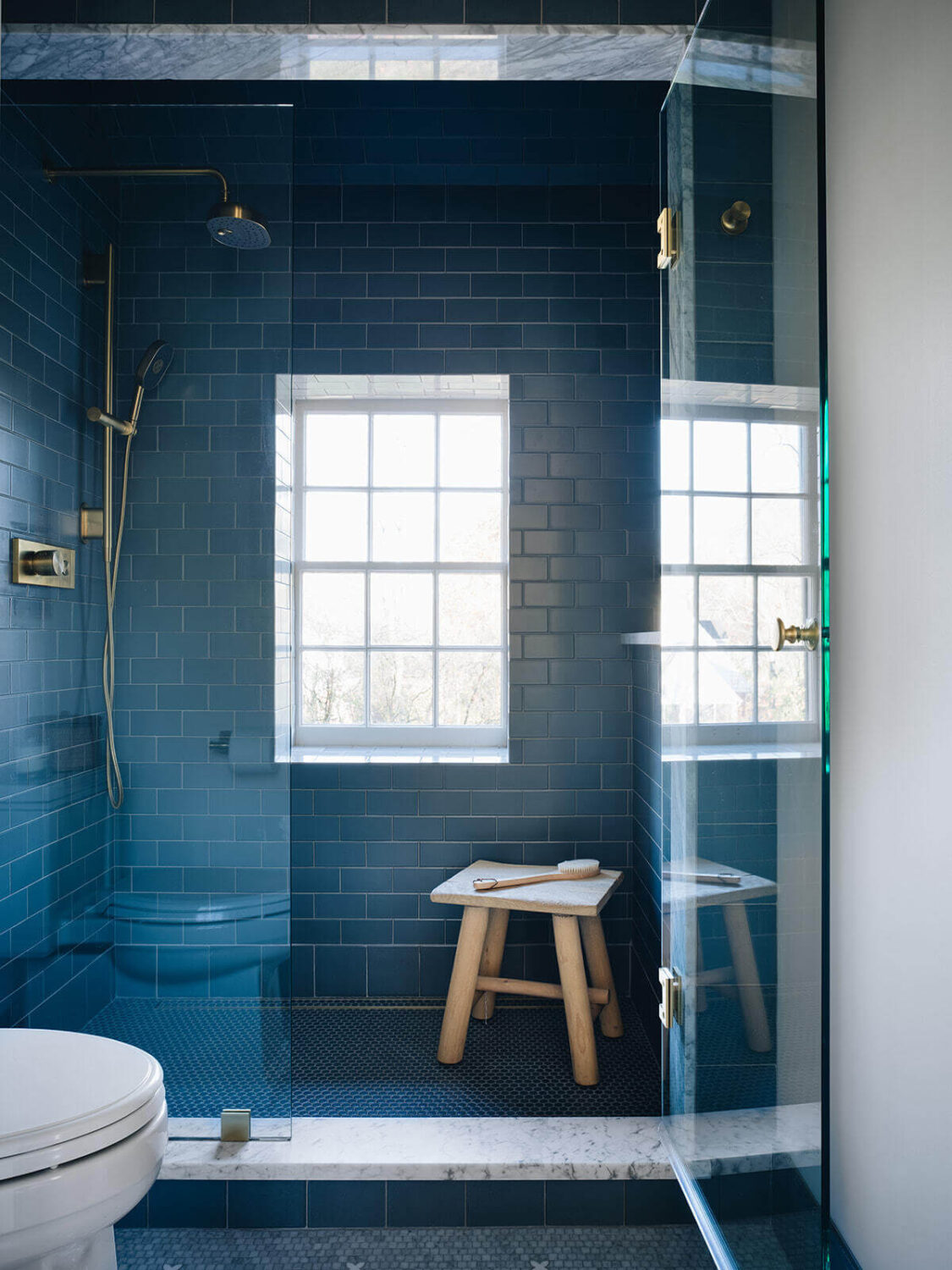 bathroom-large-shower-window-blue-tiles-jean-stoffer-design-nordroom