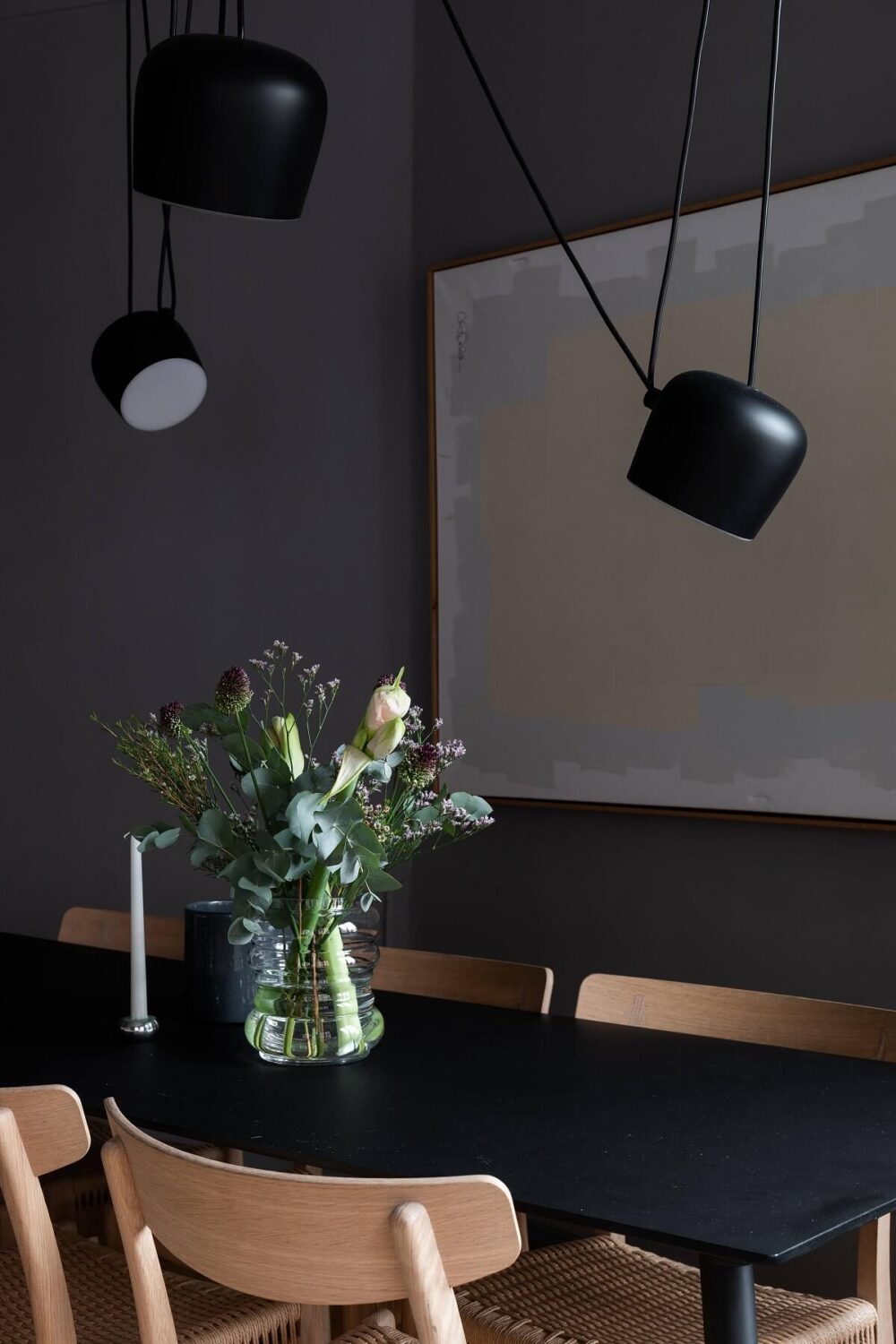 black-dining-table-large-artwork-nordroom