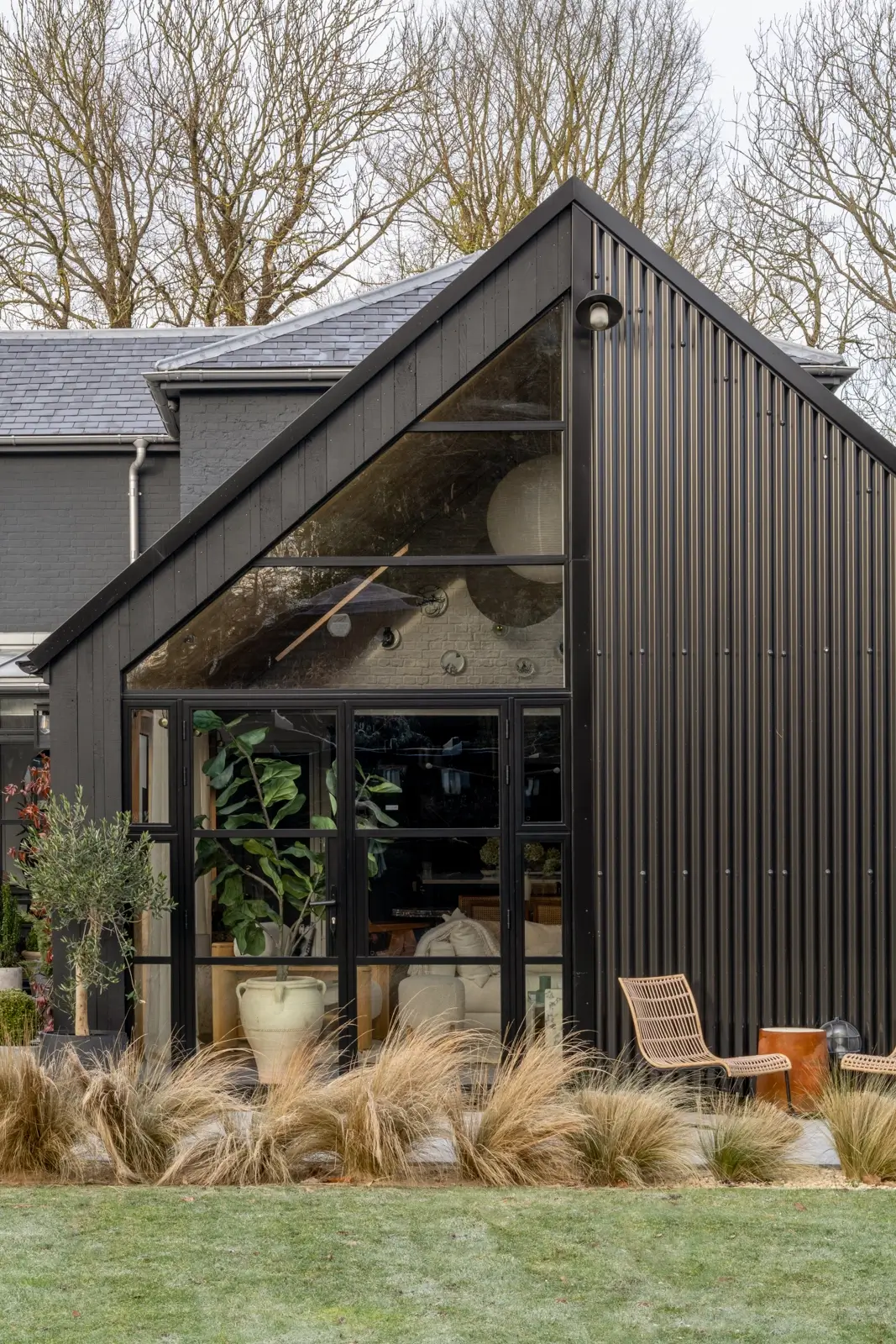 A Victorian Home with a Modern Black Extension