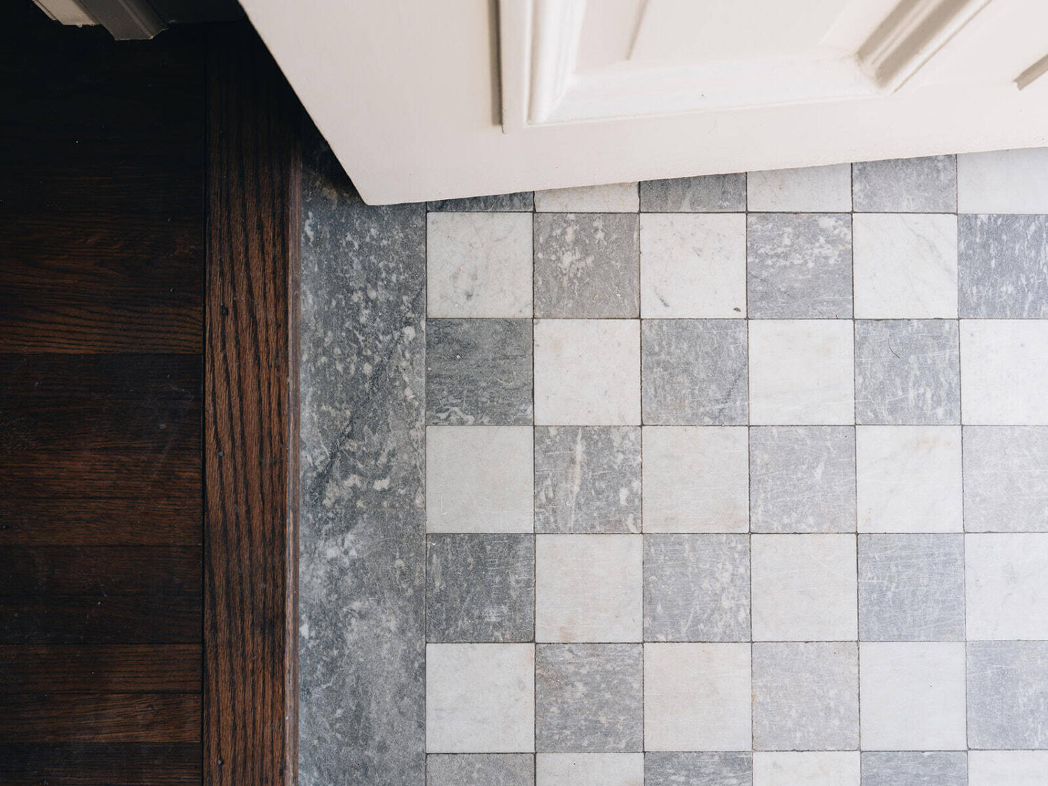 black-white-hallway-tiles-historic-home-grand-rapids-jean-stoffer-nordroom