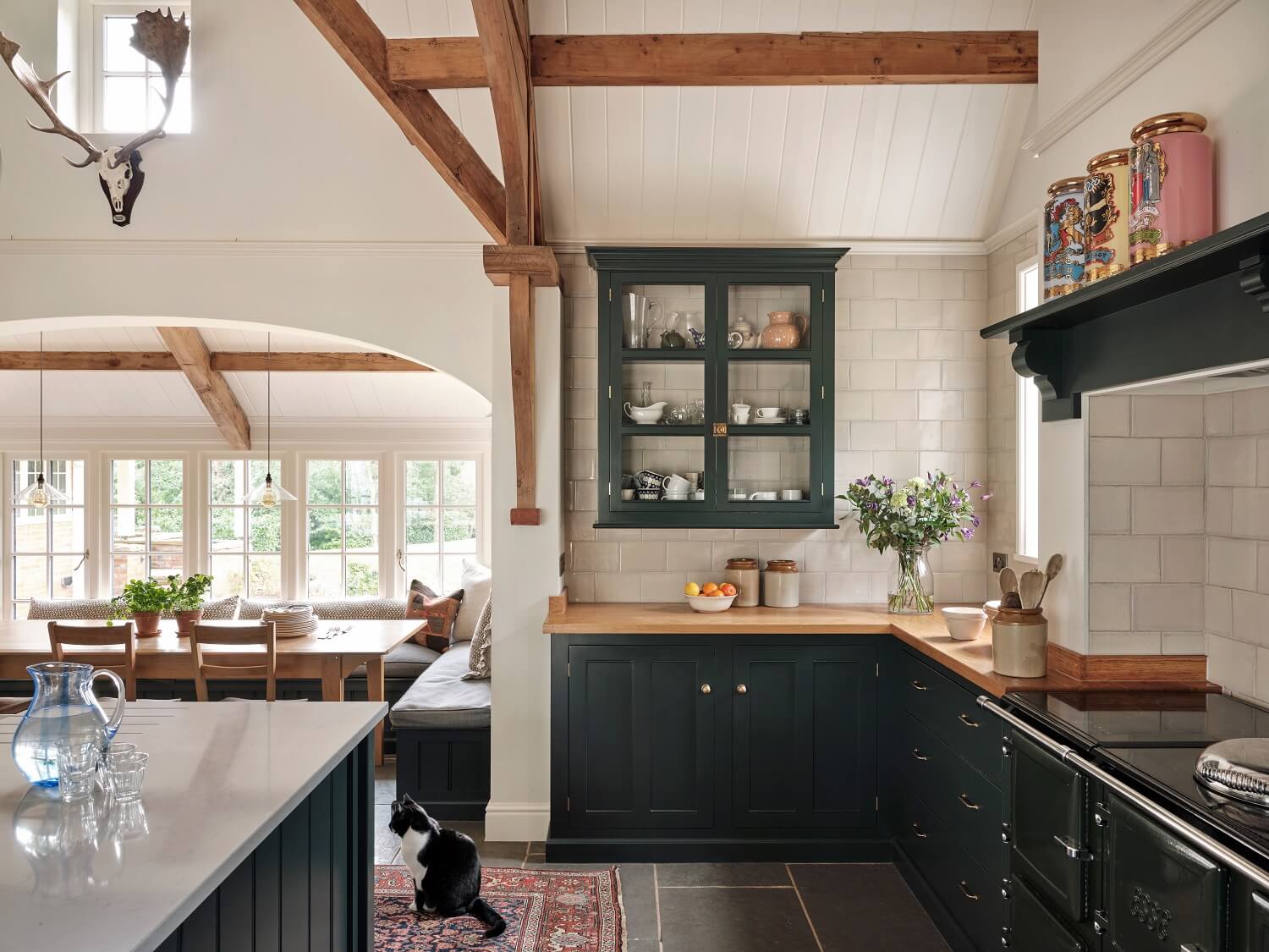 blue-kitchen-cabinets-devol-exposed-wooden-beams-wooden-worktop-nordroom
