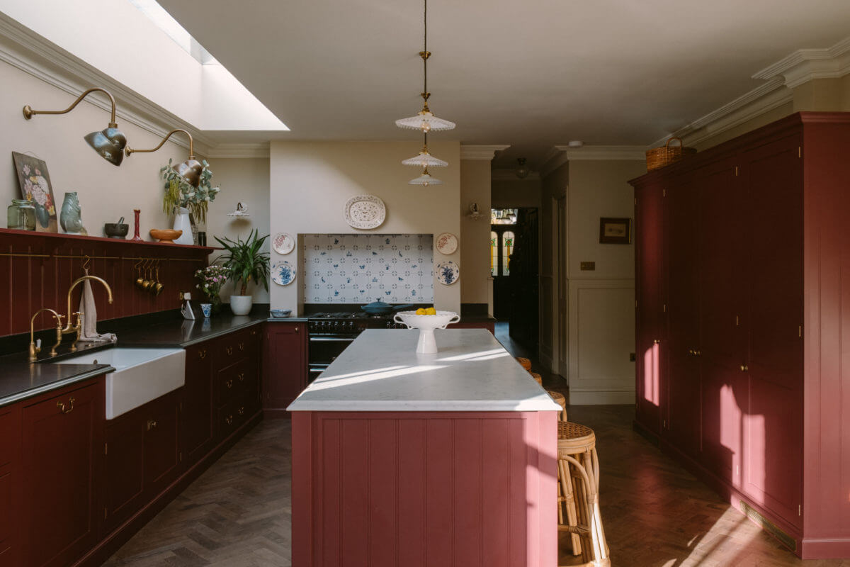 deep-red-devol-kitchen-island-wooden-floor-skylight-nordroom