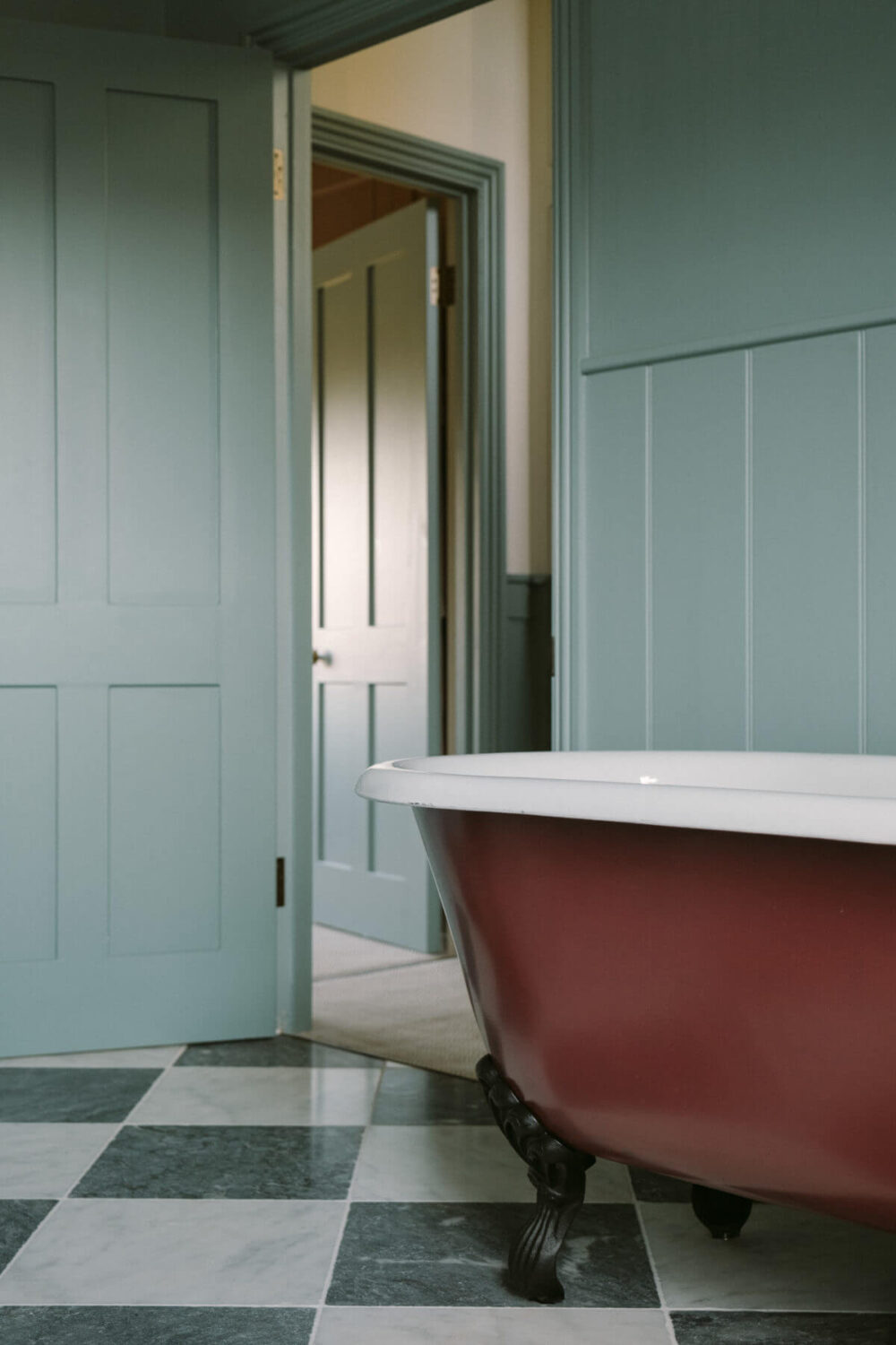 light-blue-gray-bathroom-pink-clawfoot-bath-checkerboard-floor-nordroom