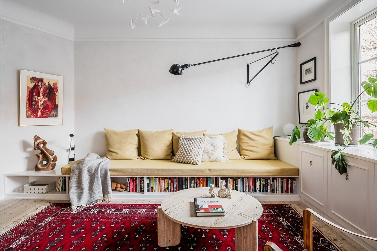 living-room-built-in-sofa-storage-pink-rug-nordroom