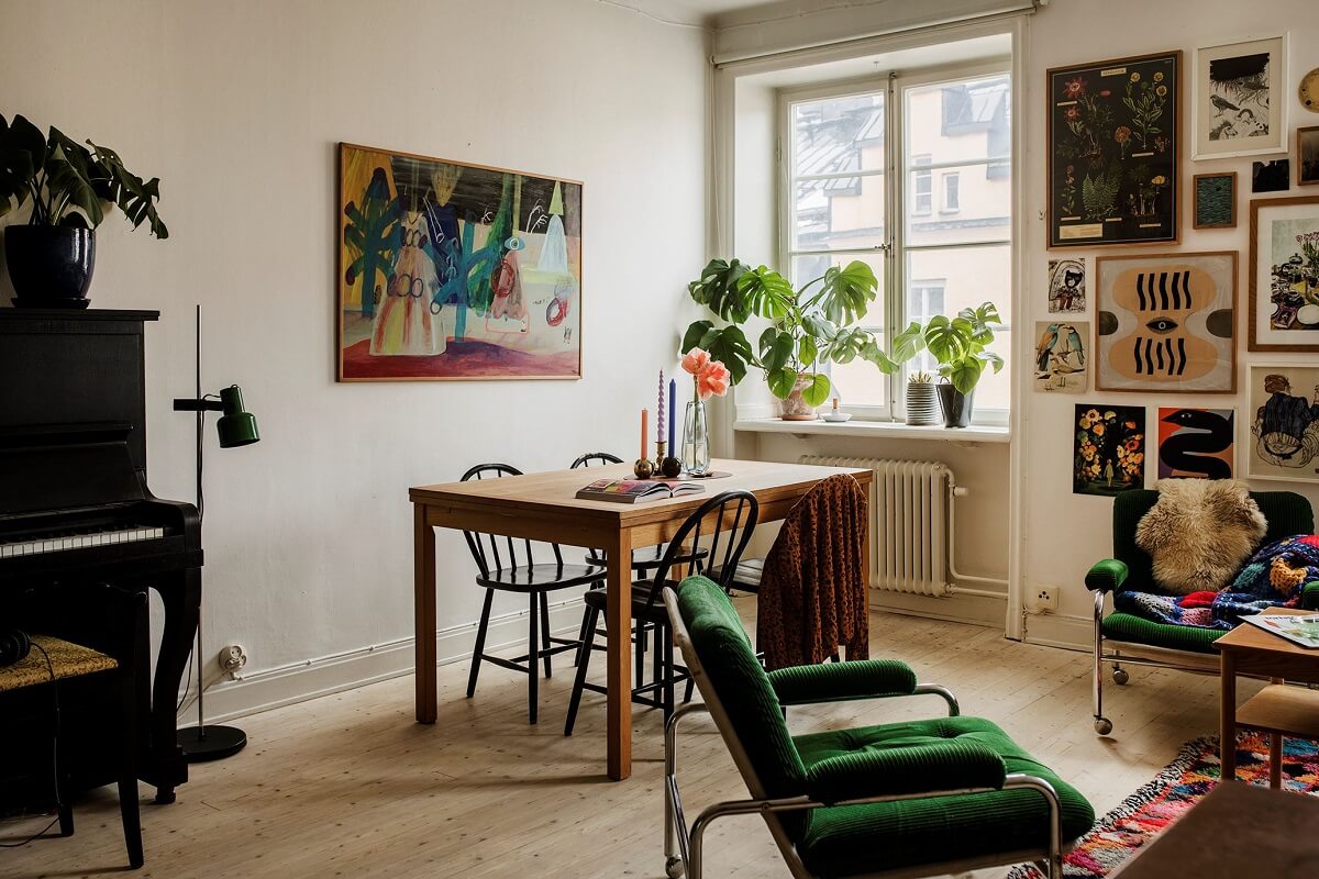 living-room-green-armchair-wooden-floor-gallery-wall-nordroom