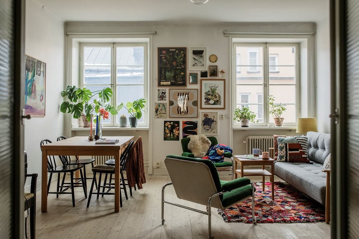 living-room-wooden-floor-rug-dining-space-gallery-wall-nordroom