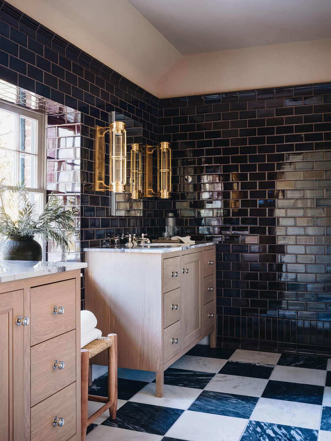 master-bathroom-checkerboard-floor-tiles-dark-blue-wall-tiles-pink-bathroom-vanity-nordroom