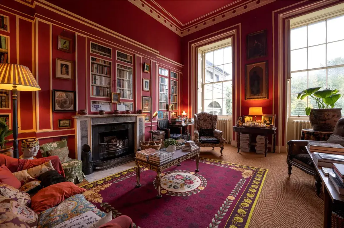 red-sitting-room-pink-rug-art-green-revivial-country-house-scotland-nordroom
