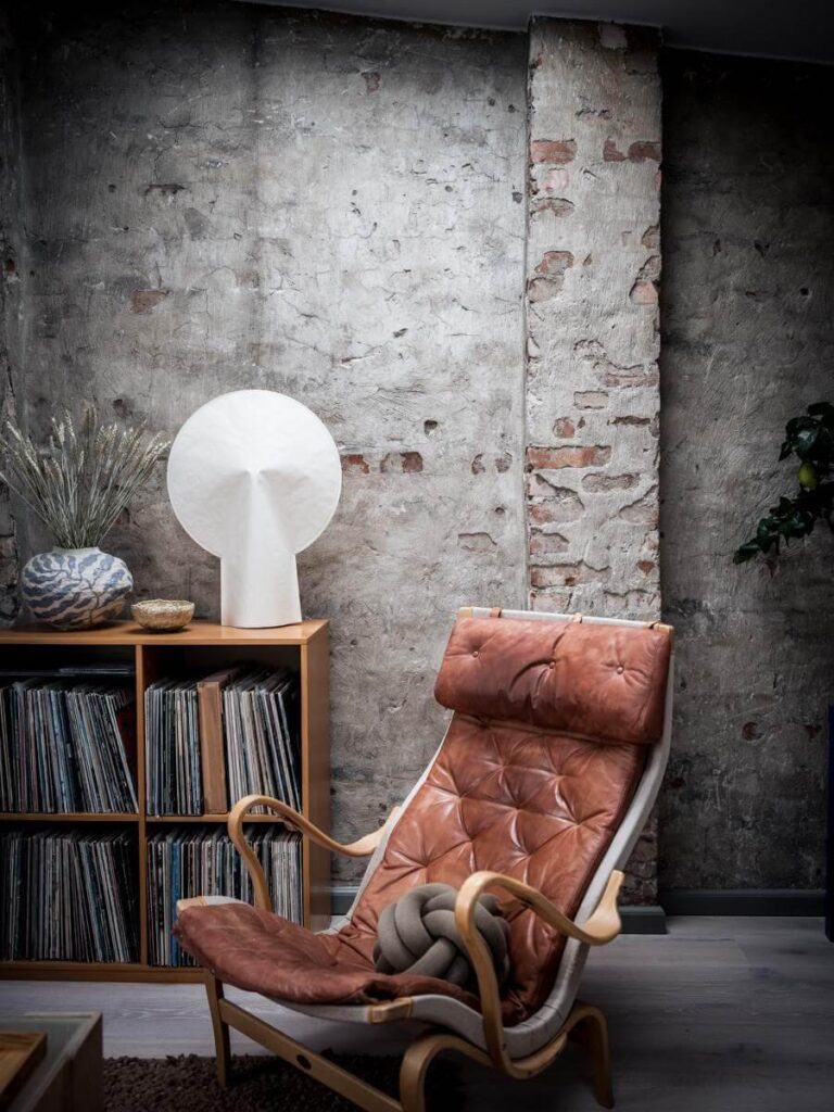 Image showcasing A Small Scandinavian Loft with Skylights and Brick Wall - The Nordroom