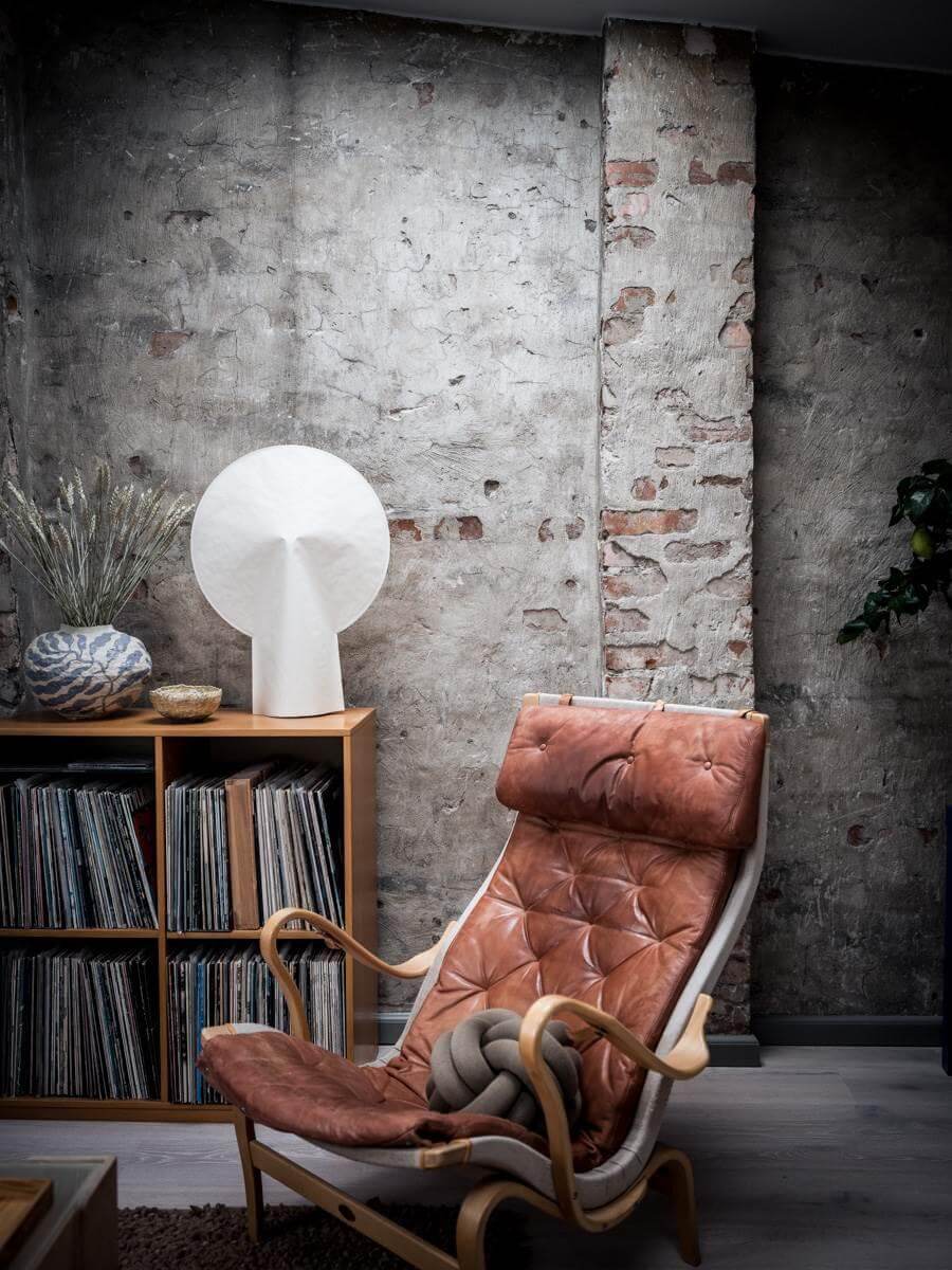 scandinavian-lounge-chair-exposed-brick-wall-nordroom