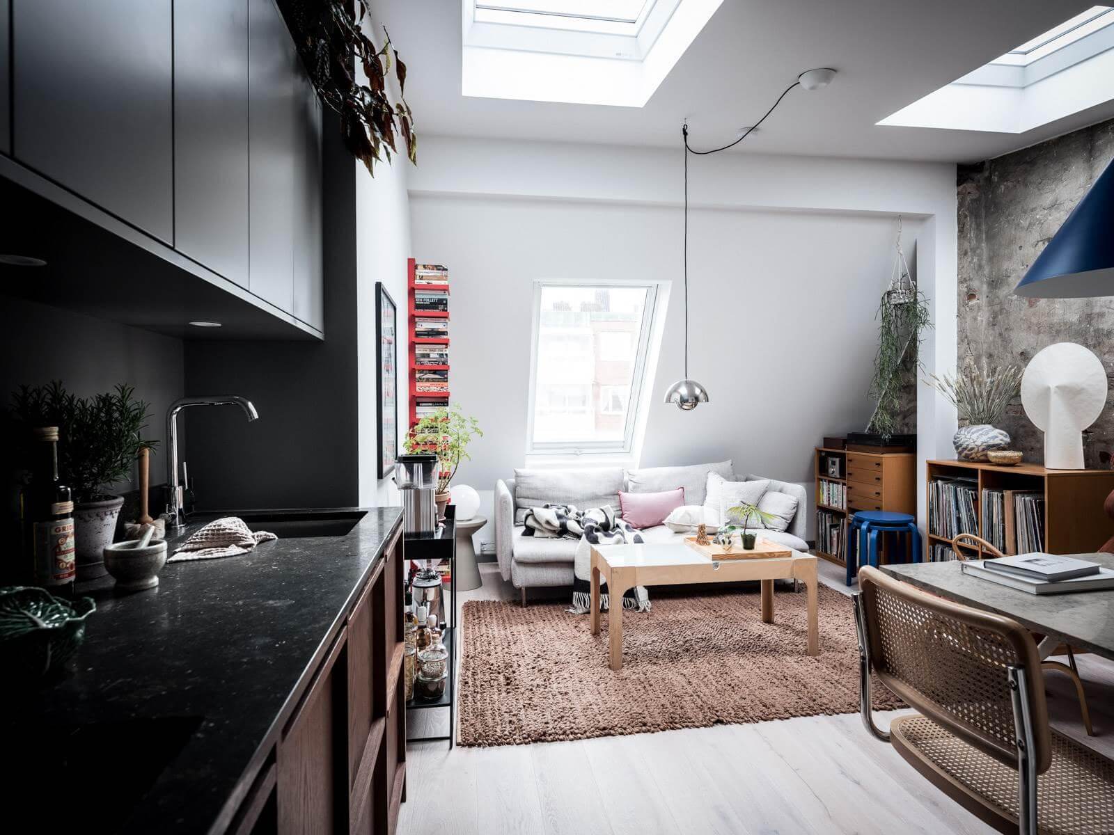 small-attic-loft-skylight-exposed-brick-wall-nordroom