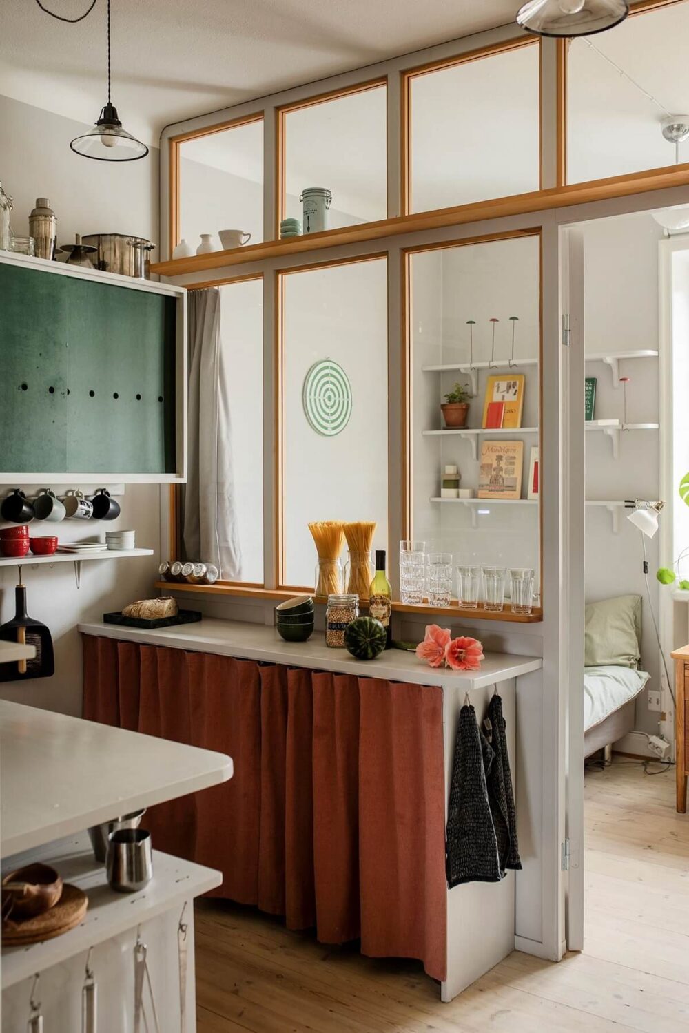 small-kitchen-green-cabinets-window-between-bedroom-nordroom