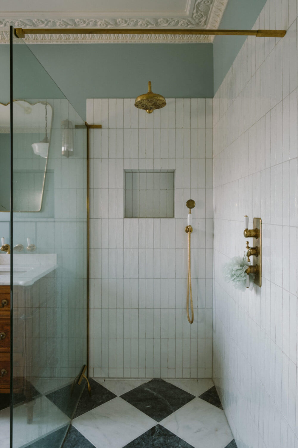 walk-in-shower-white-tiles-checkerboard-floor-nordroom