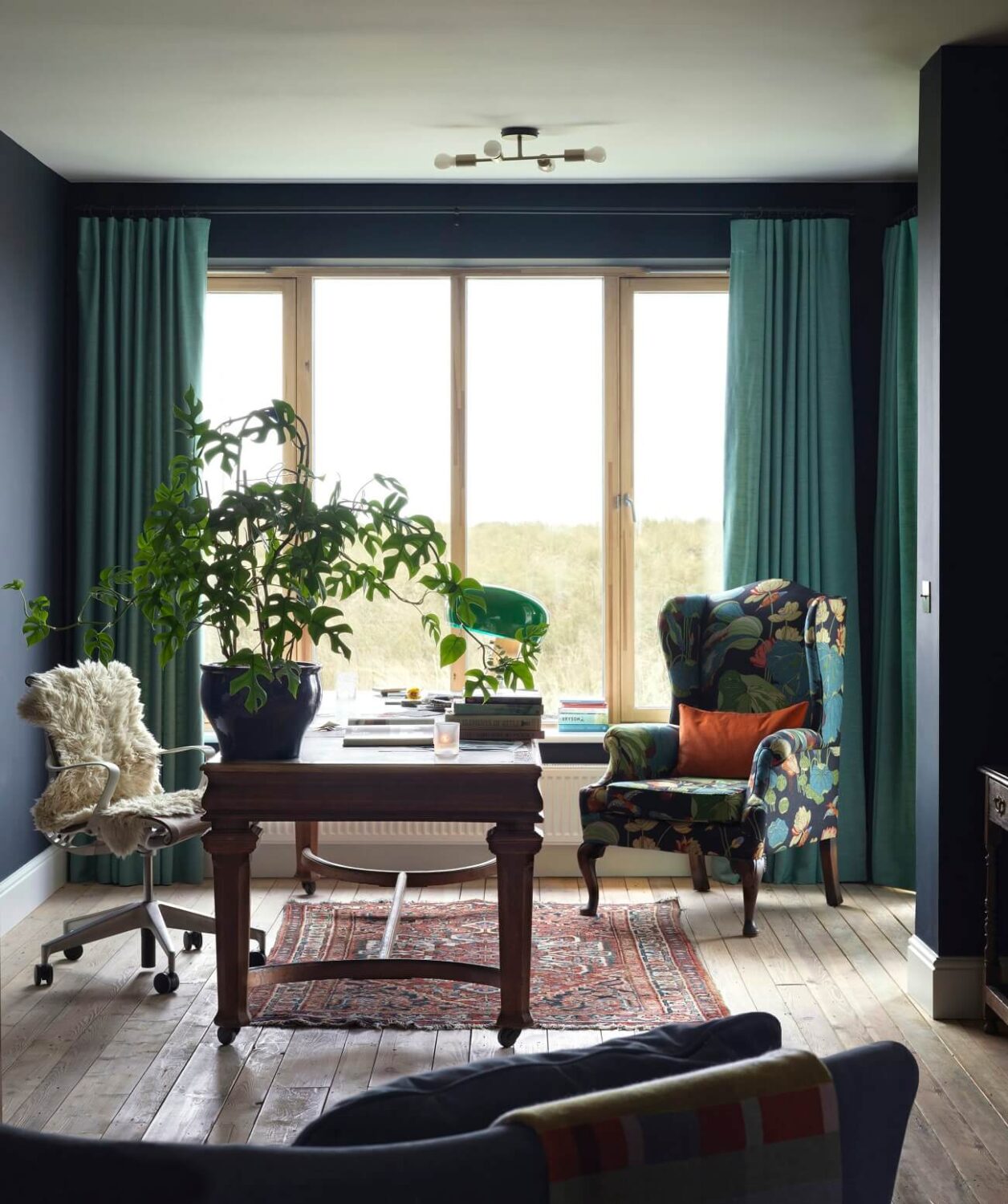 colorful-home-office-antique-desk-blue-walls-nordroom