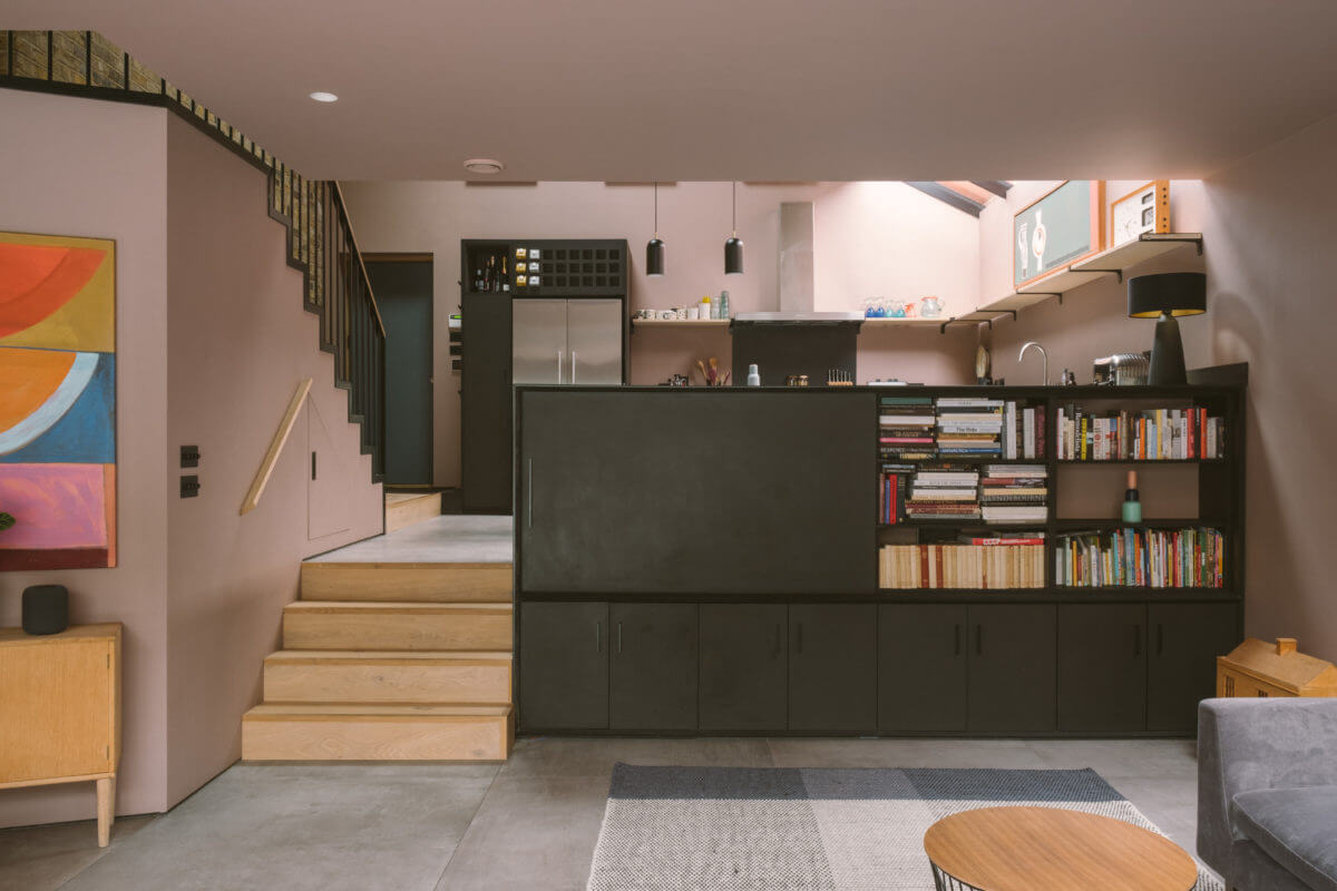 living-room-built-in-bookcase-split-level-pink-walls-nordroom