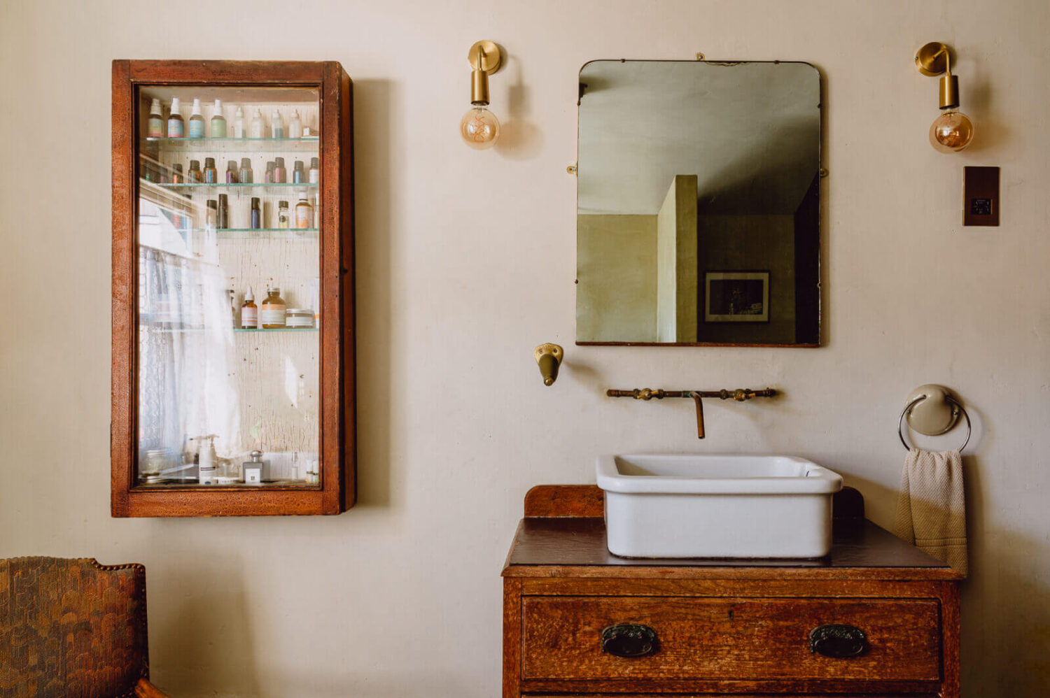 bathroom-antique-vanity-plaster-walls-nordroom