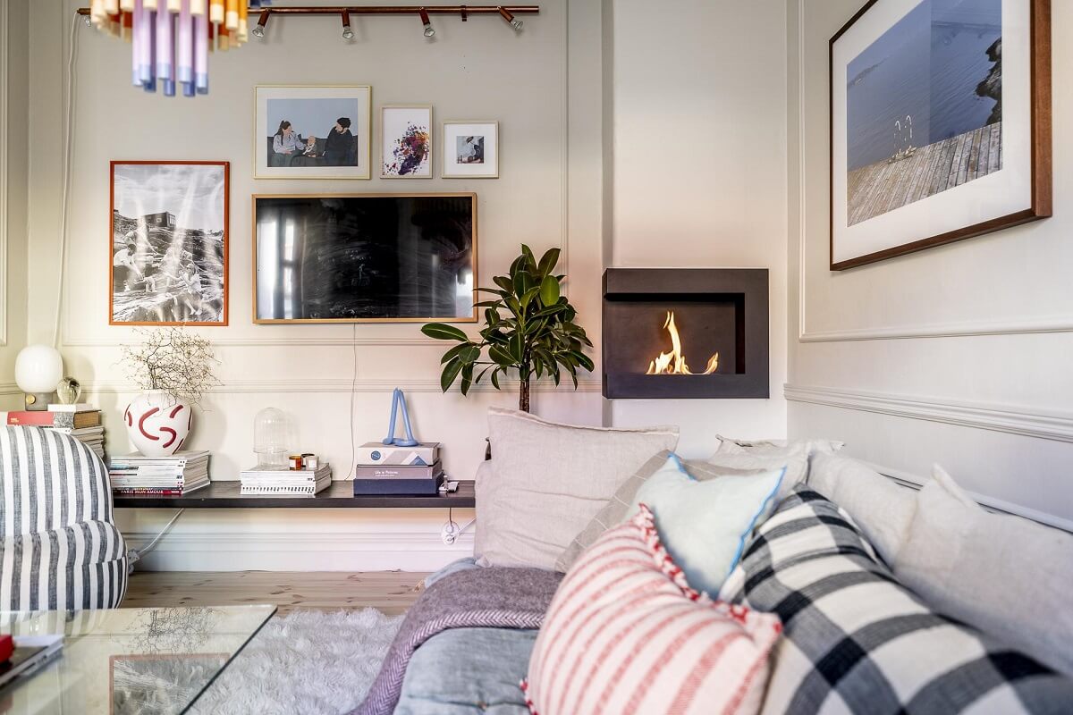 living-room-detail-corner-fireplace-beige-walls-nordroom