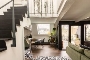 Image showcasing An Amsterdam Penthouse with Green Color Accents - The Nordroom