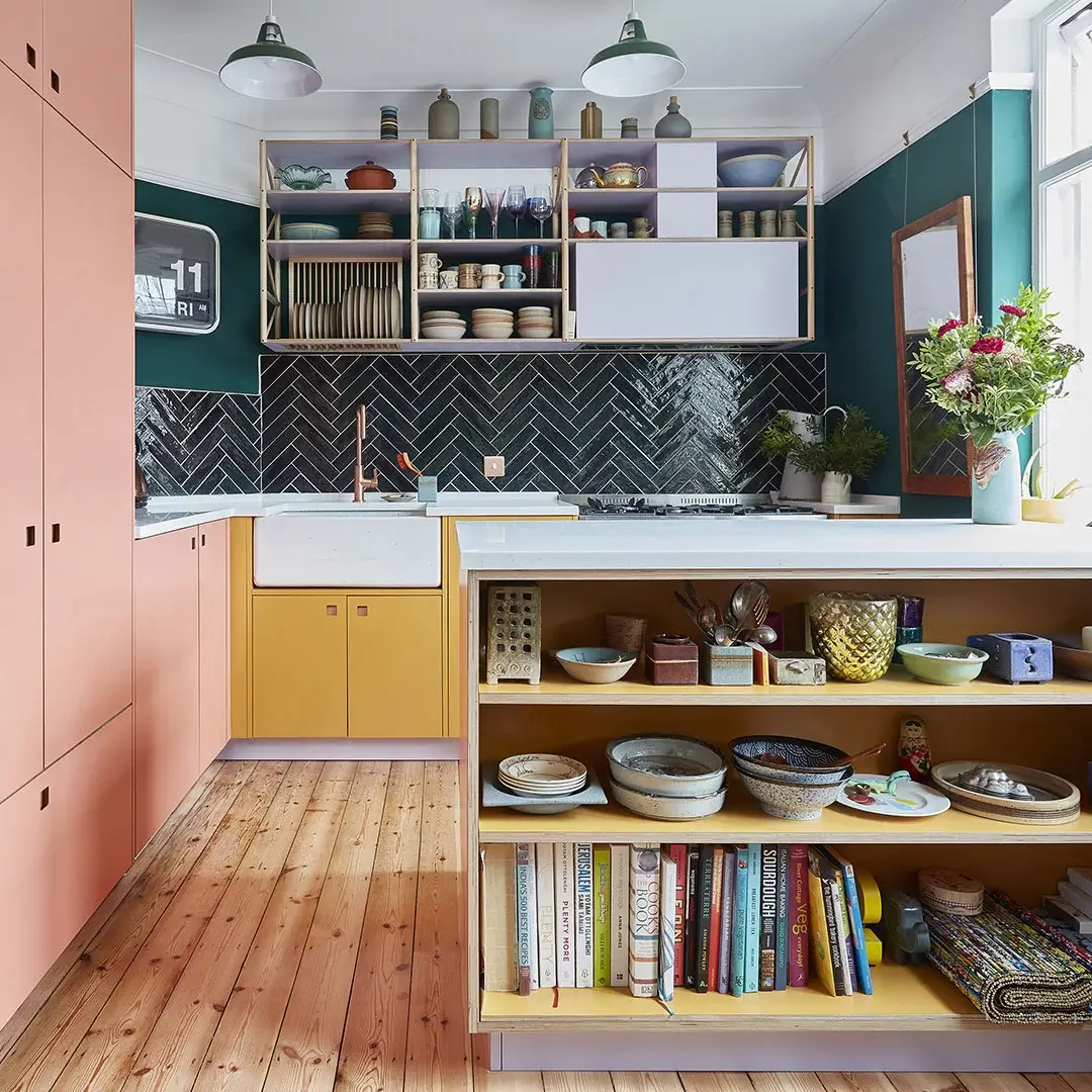 pluck-kitchen-two-tone-cabinets-yellow-pink-wooden-floor-nordroom