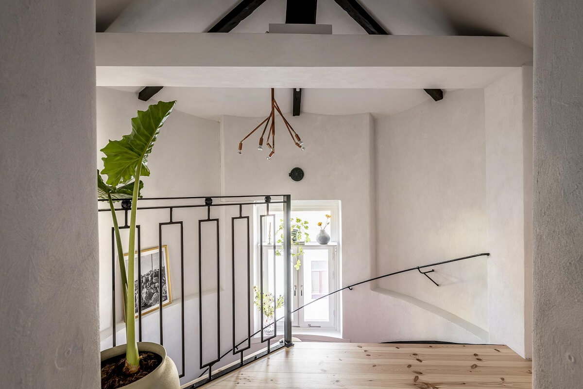 staircase-hallway-wooden-floorboards-swedish-maisonette-nordroom