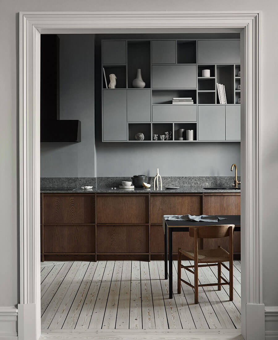 Grey kitchen cabinets against sage green walls in an attic apartment - COCO  LAPINE DESIGNCOCO LAPINE DESIGN