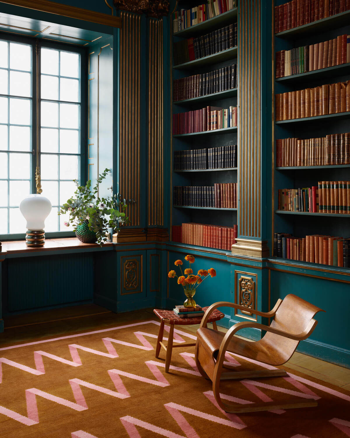 Folding-Ribbon-teal-bookcases-campbell-rey-nordic-knots-rug-collection-nordroom