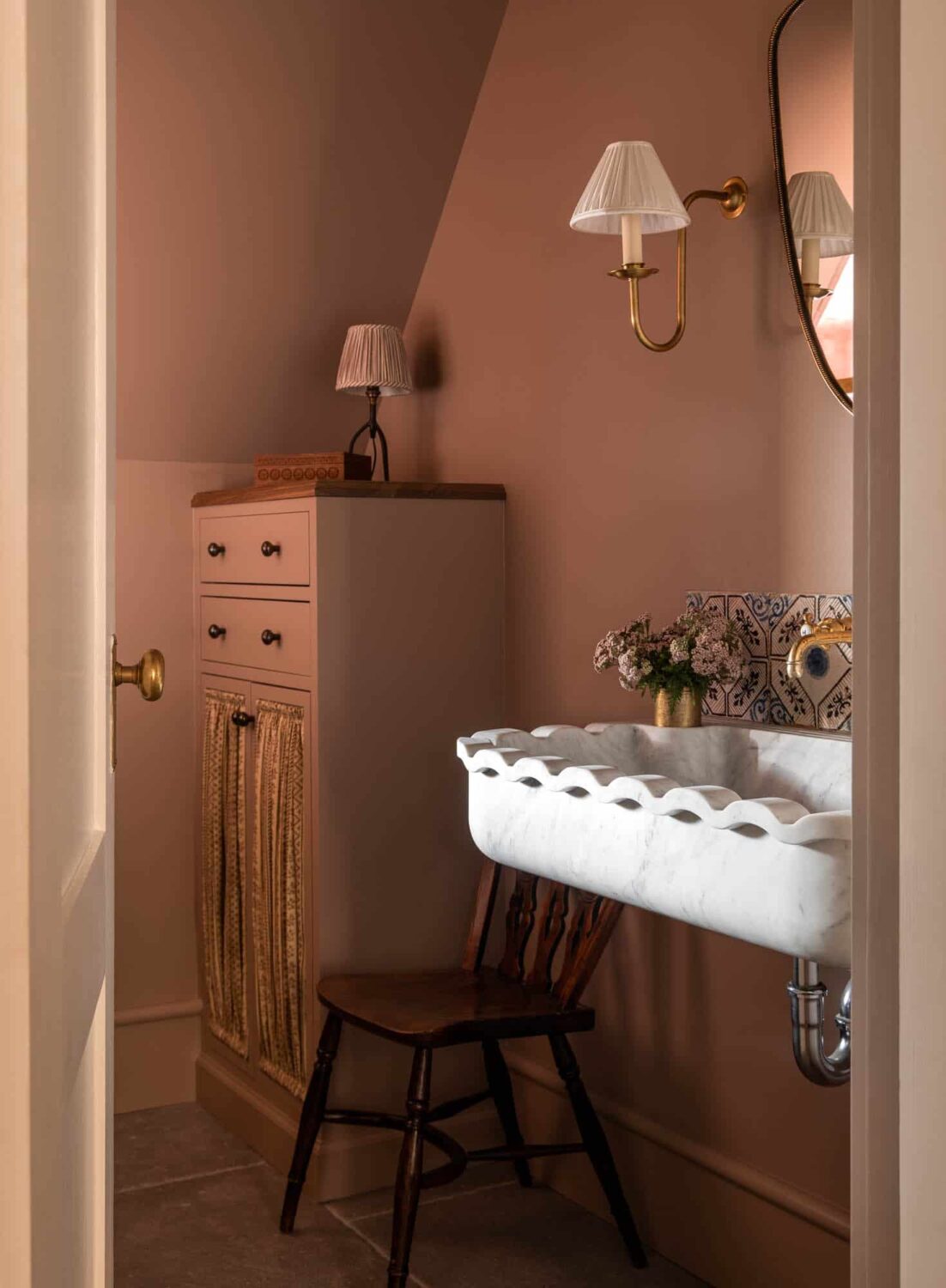 bathroom-slanted-ceiling-pink-walls-sink-nordroom