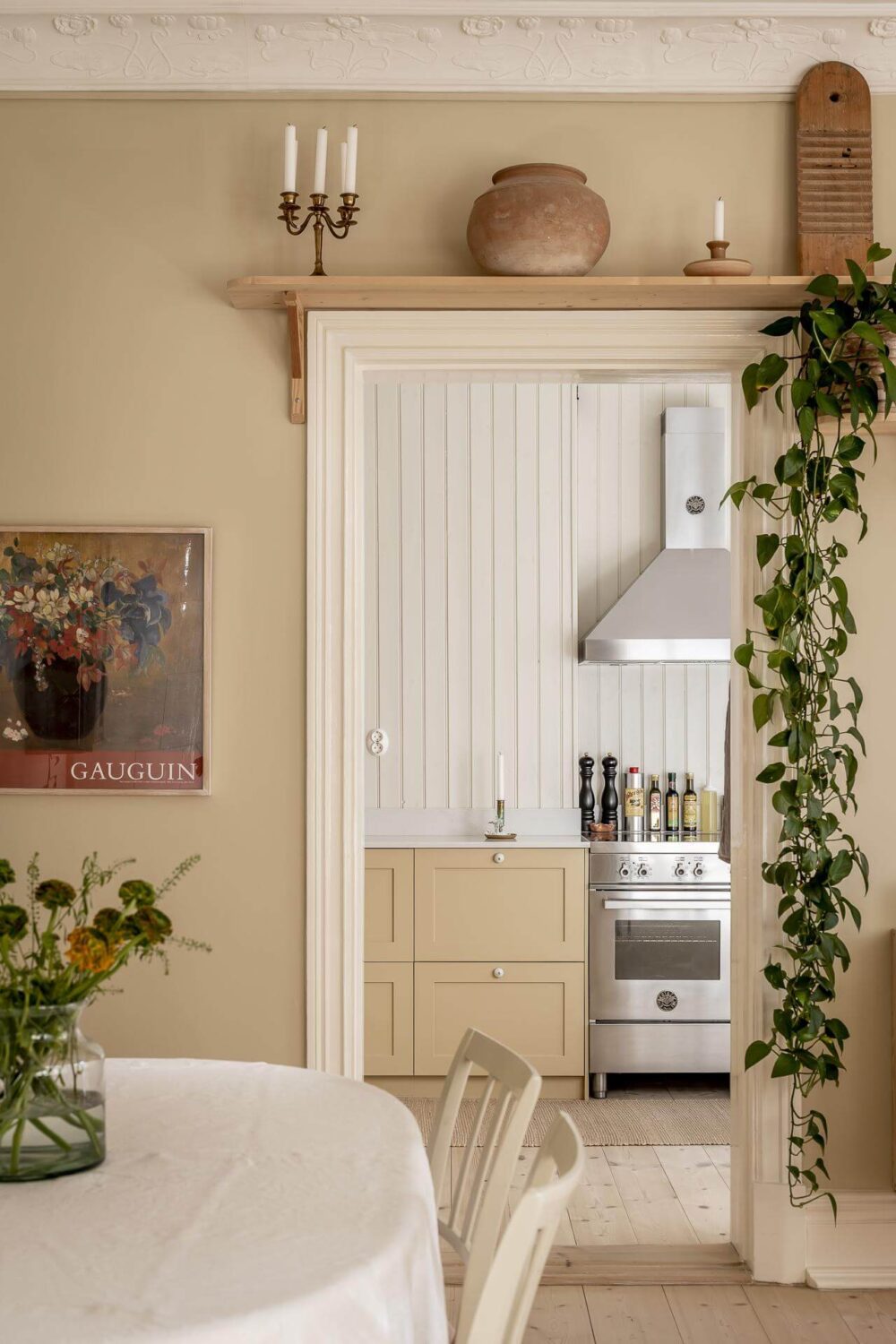 beige-walls-wooden-shelf-above-door-kitchen-nordroom