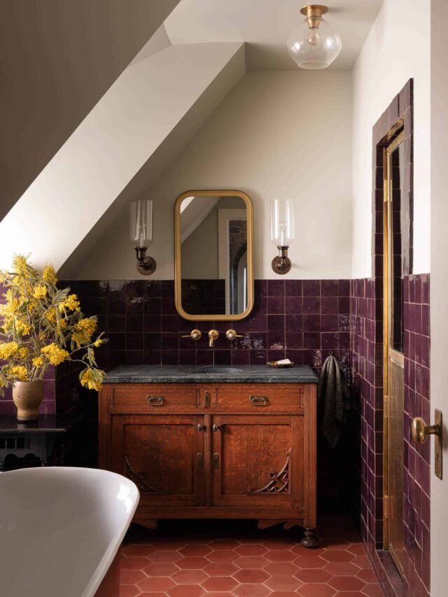 bathroom-antique-sanity-soapstone-sink-purple-tiles-hexagon-terracotta-floor-tiles-slanted-ceiling-nordroom