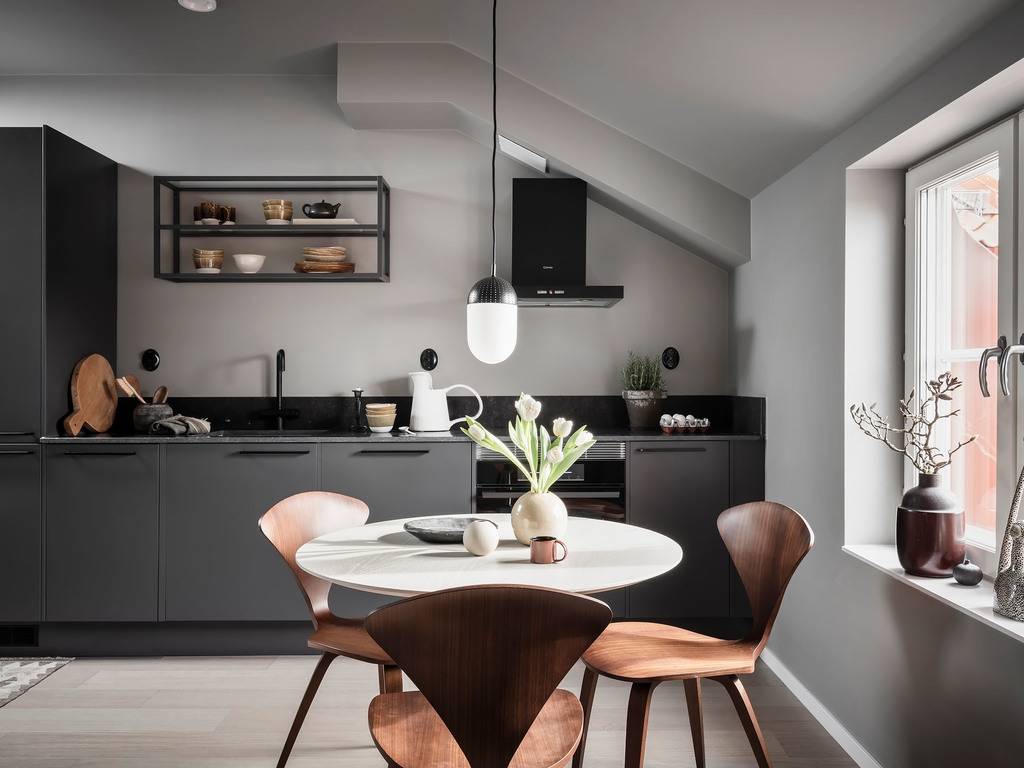 gray-kitchen-cabinets-round-dining-table-nordic-design-nordroom