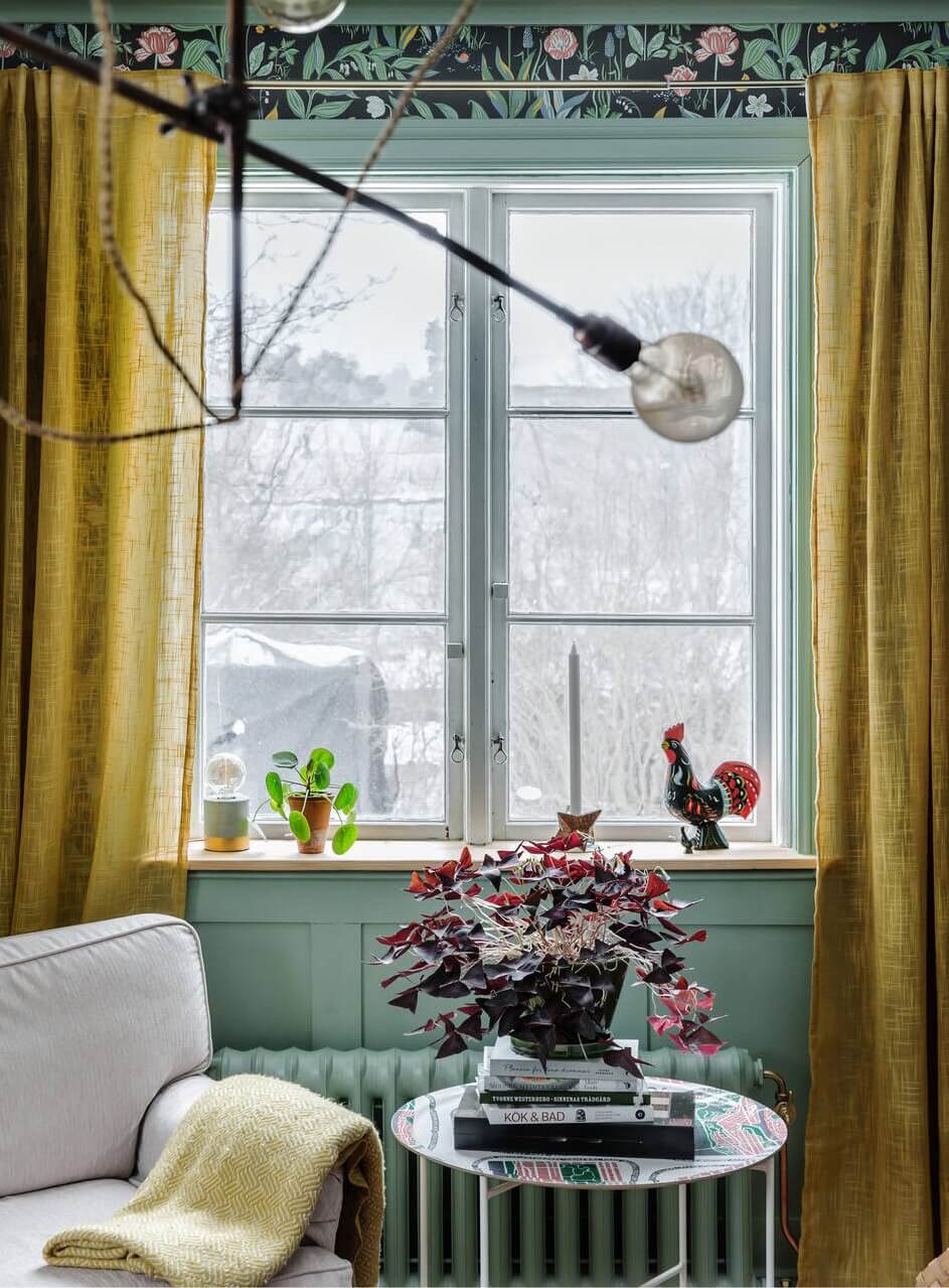 living-room-detail-armchair-yellow-curtains-nordroom