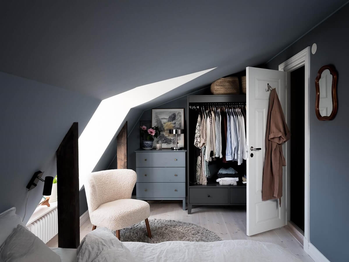 open-wardrobe-attic-apartment-blue-walls-nordroom