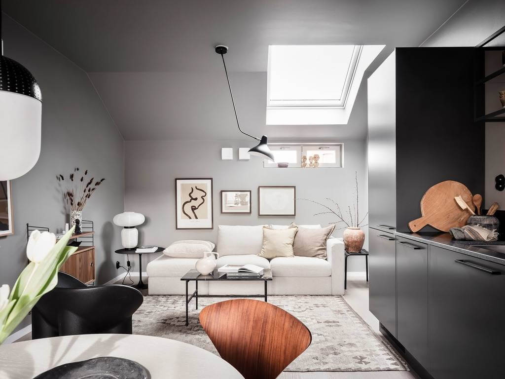 scandinavian-attic-apartment-gray-walls-black-kitchen-skylight-nordroom