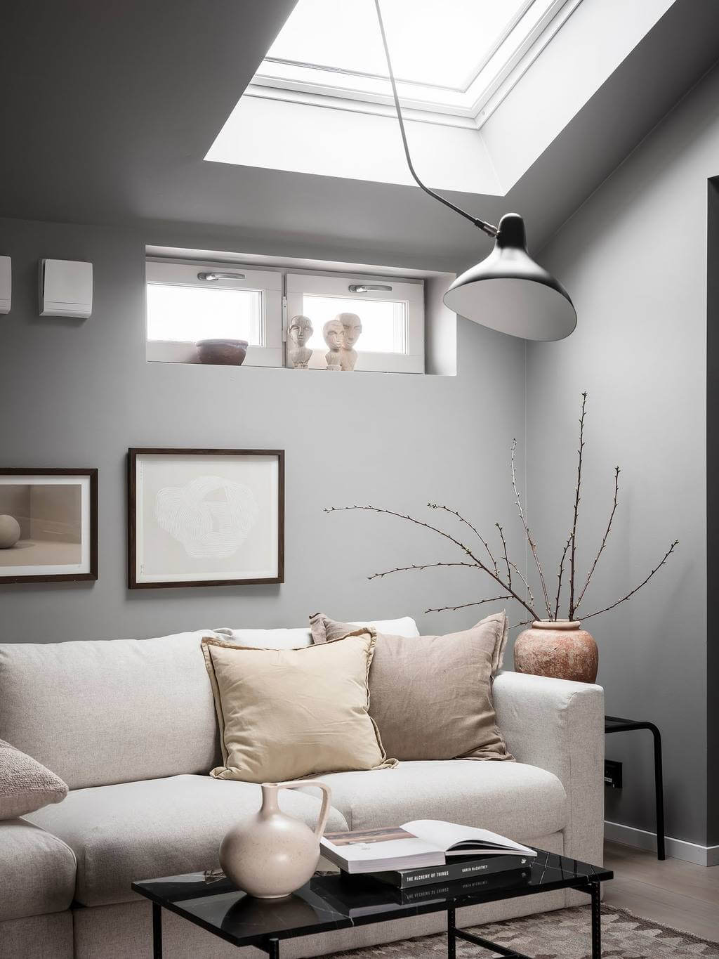 sitting-room-slanted-ceiling-skylight-gray-walls-nordroom