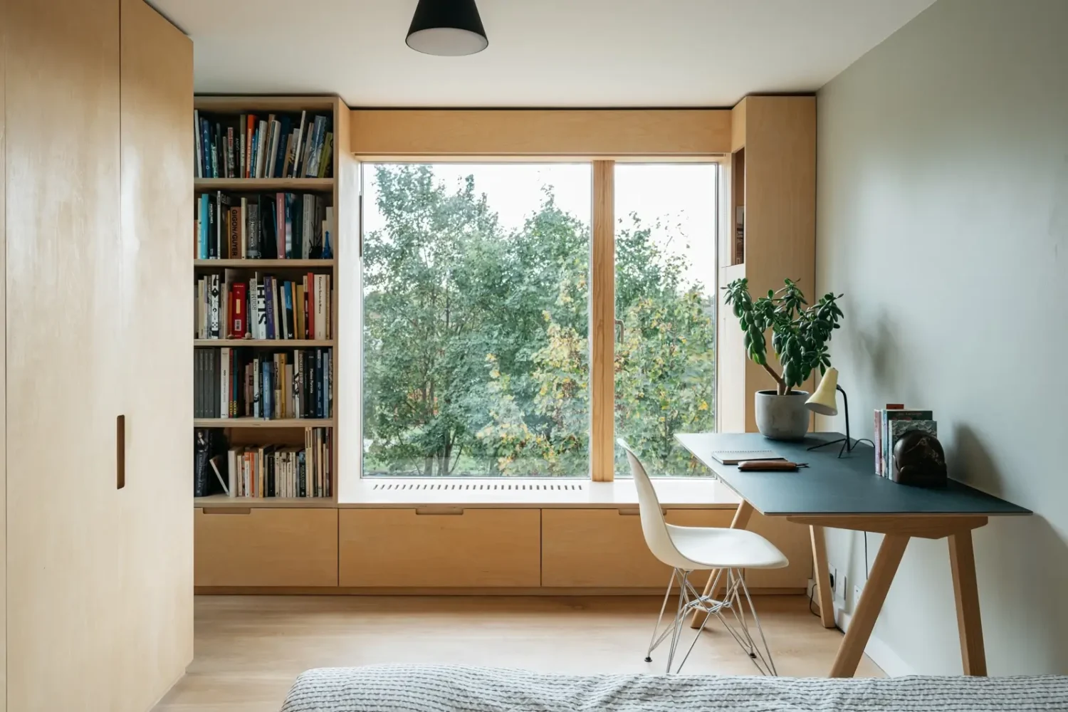 bedroom home office built in closets bookshelves window seat