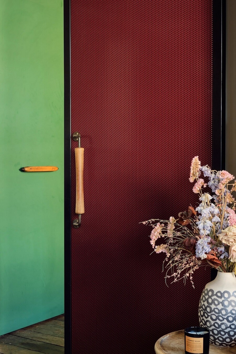 deep-red-sliding-door-industrial-apartment-nordroom