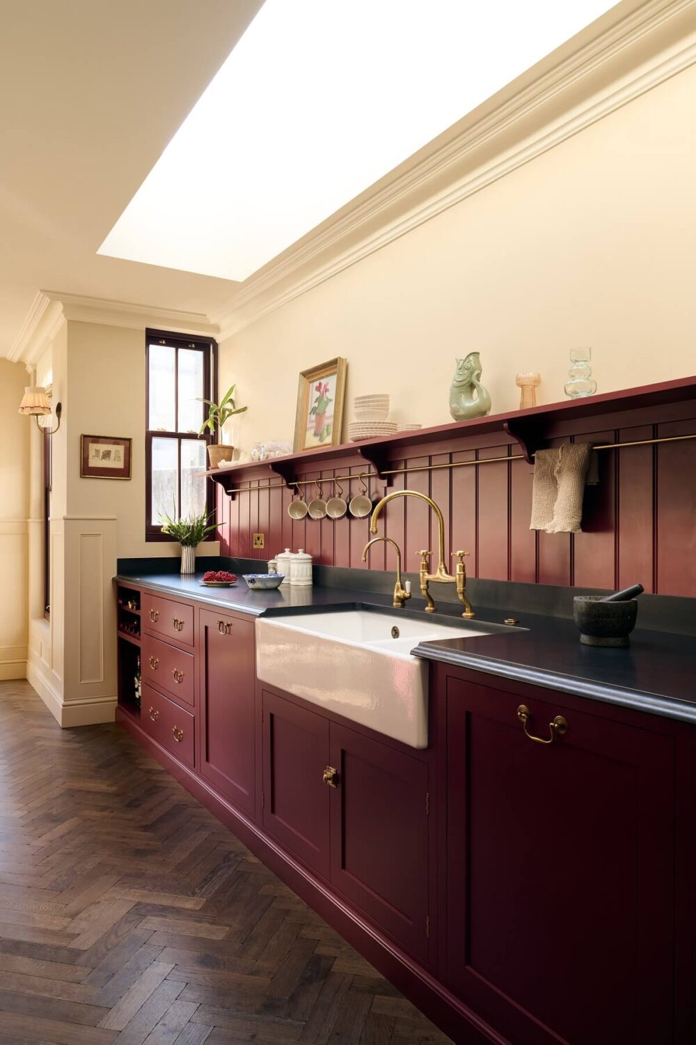 devol-real-shaker-kitchen-refectory-red-cabinets-tongue-and-groove-backsplash-skylight-nordroom