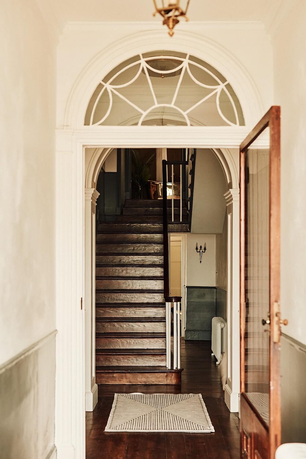 hallway-arched-doorway-staircase-nordroom