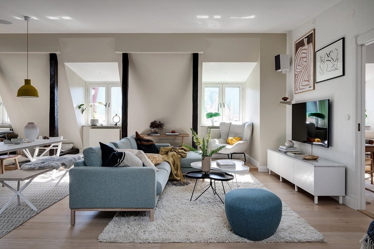 modern-living-room-light-blue-sofa-wooden-beams-nordroom