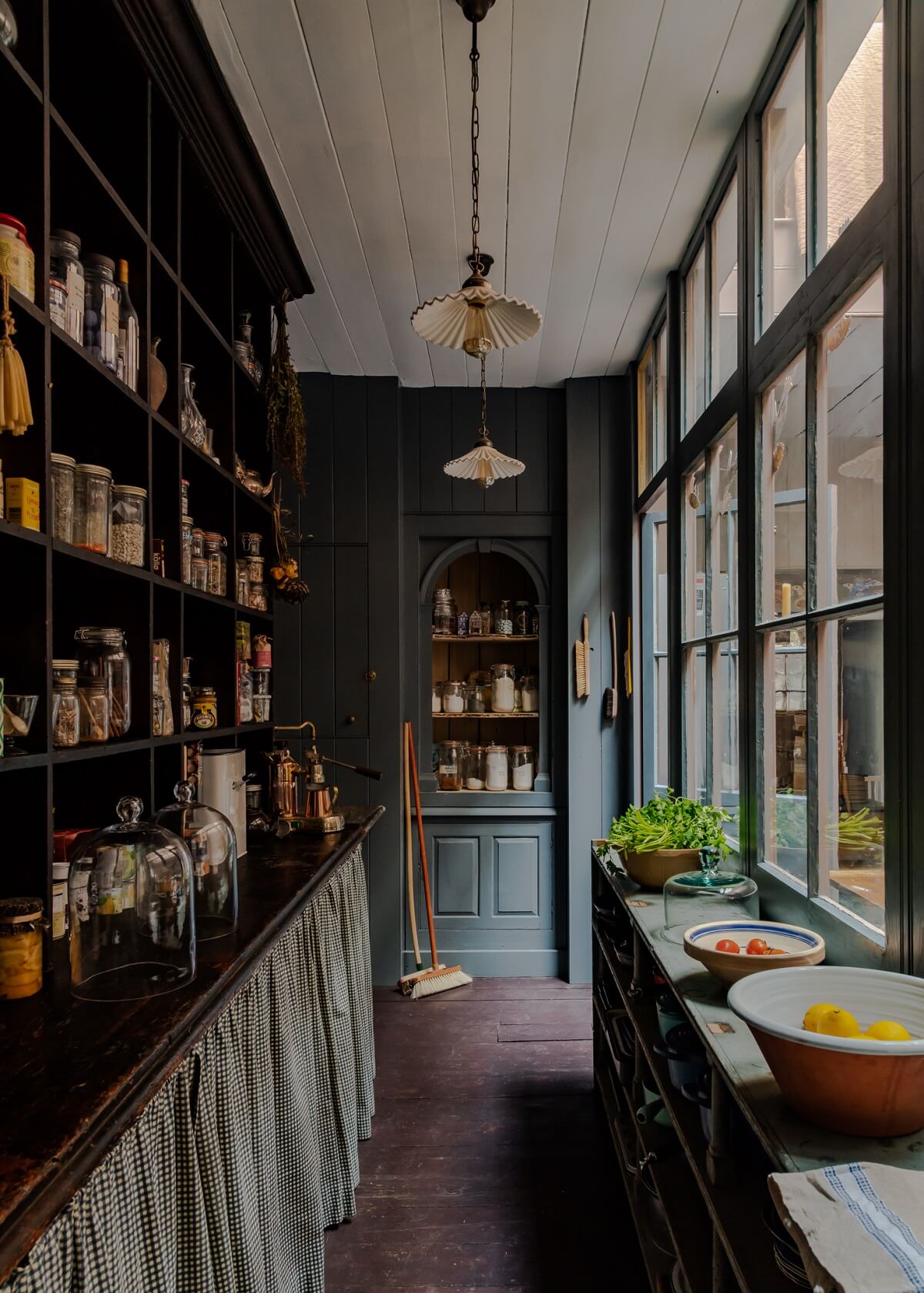moody-dark-gray-pantry-skirting-shelves-glass-wall-nordroom