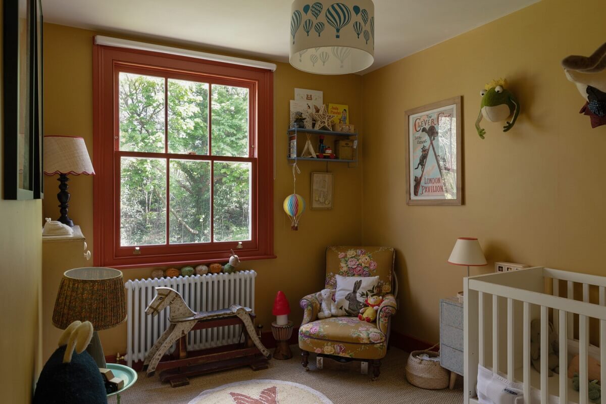 ochre-yellow-nursery-orange-red-window-frame-nordroom