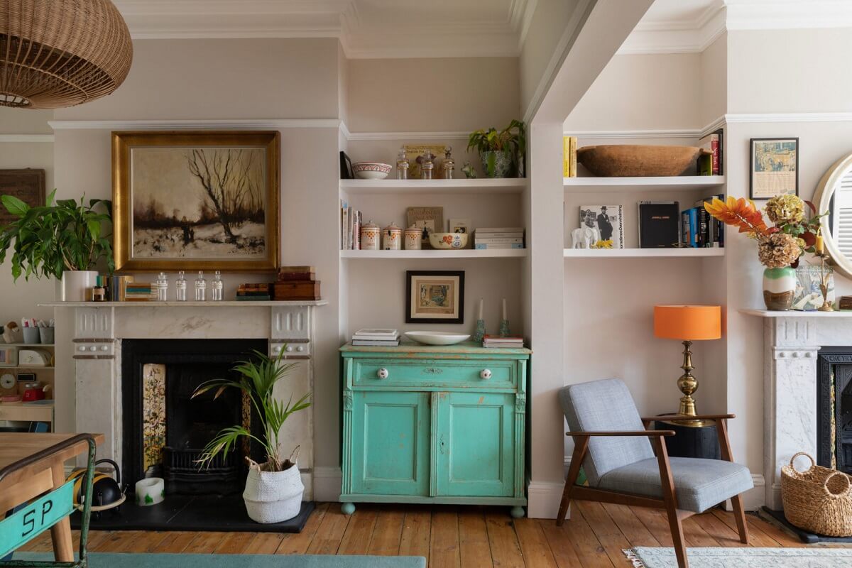 open-plan-living-room-dining-space-fireplace-wooden-floor-built-in-shelves-nordroom