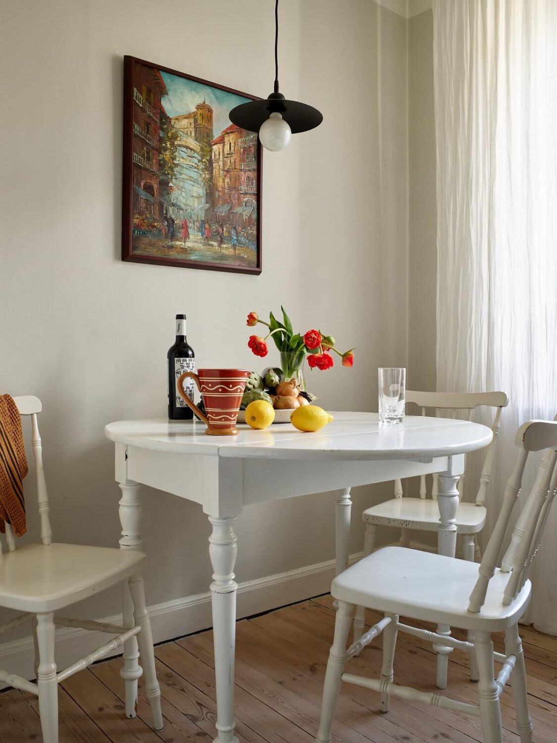 small-white-kitchen-table-wooden-floor-nordroom