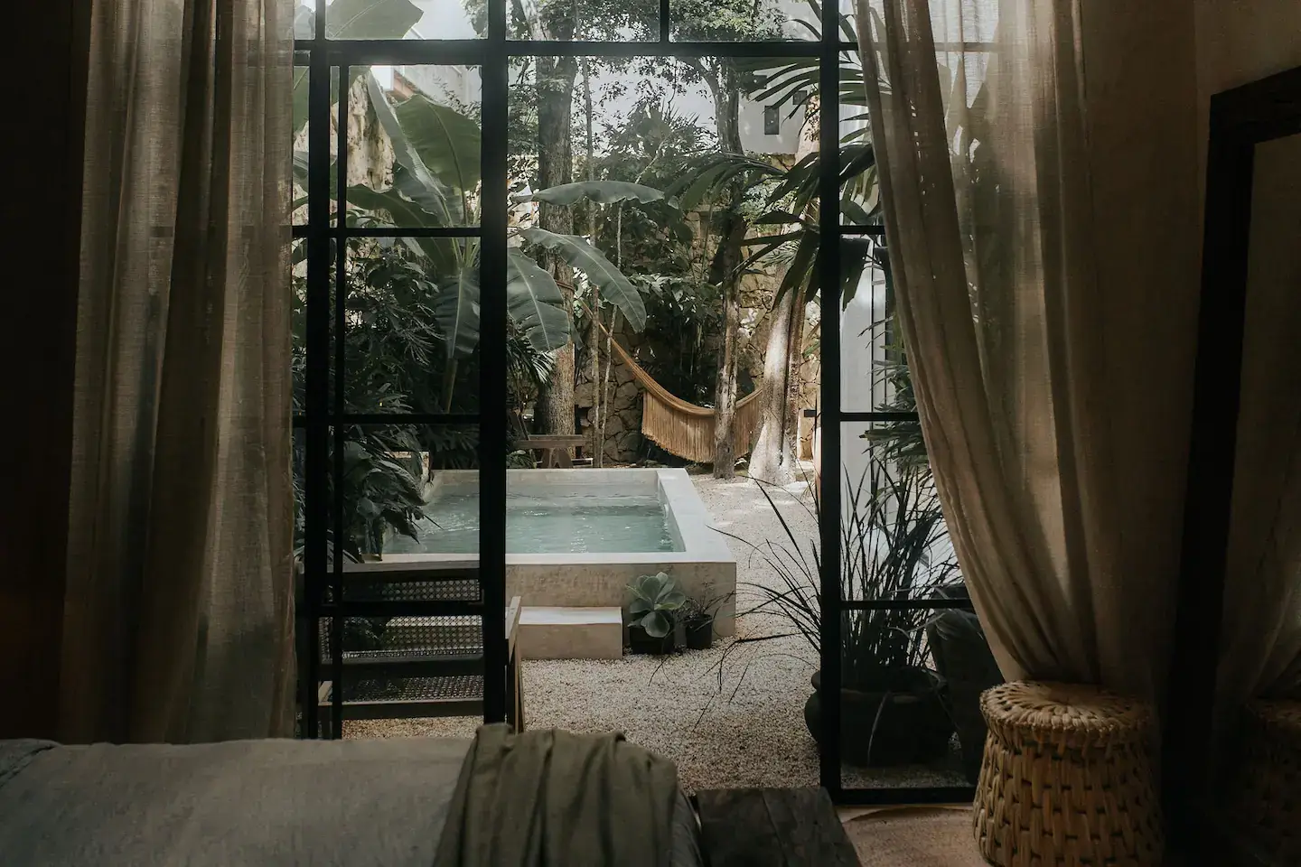 steel-framed-glass-doors-bedroom-garden-swimming-pool-nordroom