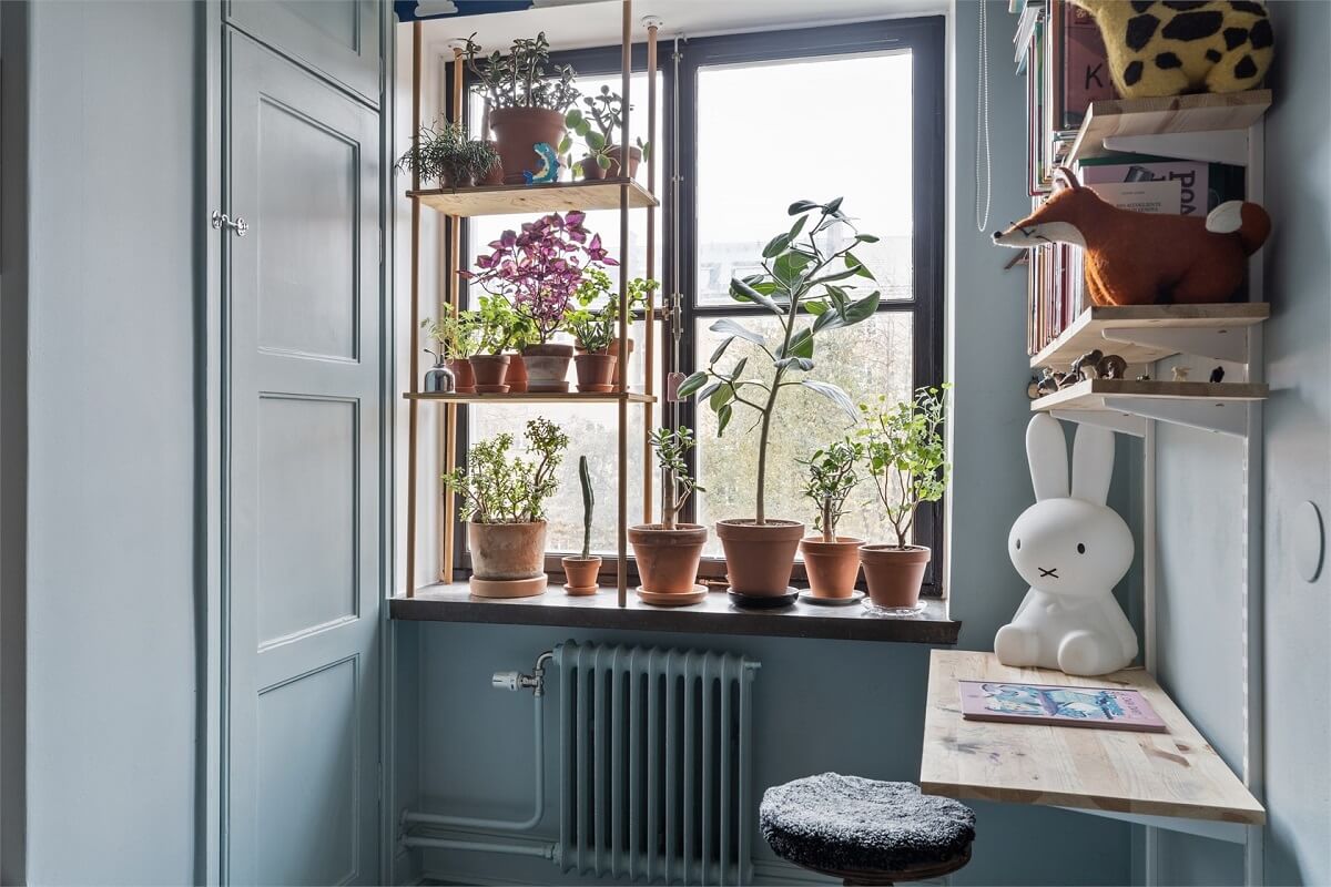 blue-kids-bedroom-plants-desk-nordroom