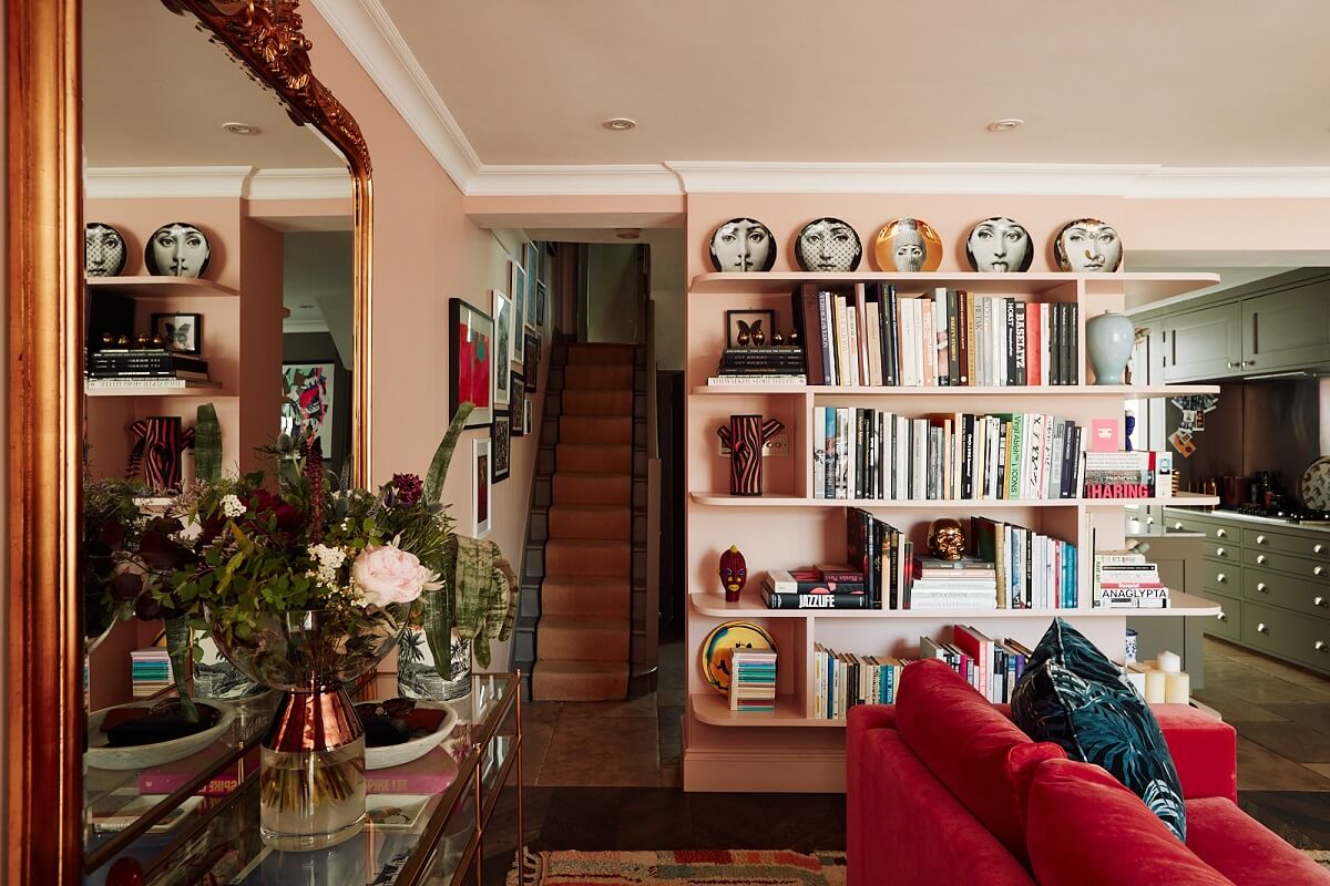 bookshelves-antique-mirror-pink-living-room-nordroom
