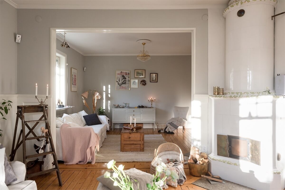 double-living-room-light-colors-fireplace-natural-light-nordroom